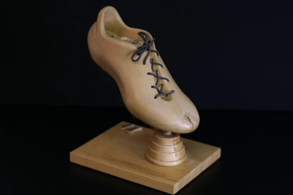 Chaussure de Football sculptée à la main